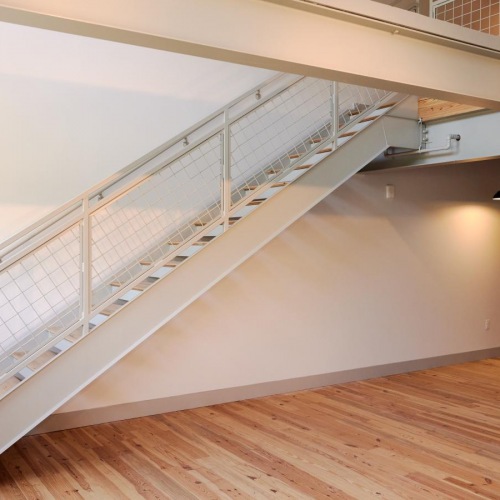 Beautiful living areas to match your lifestyle a white staircase in a house