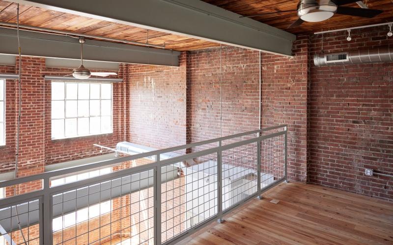 a loft in a brick room